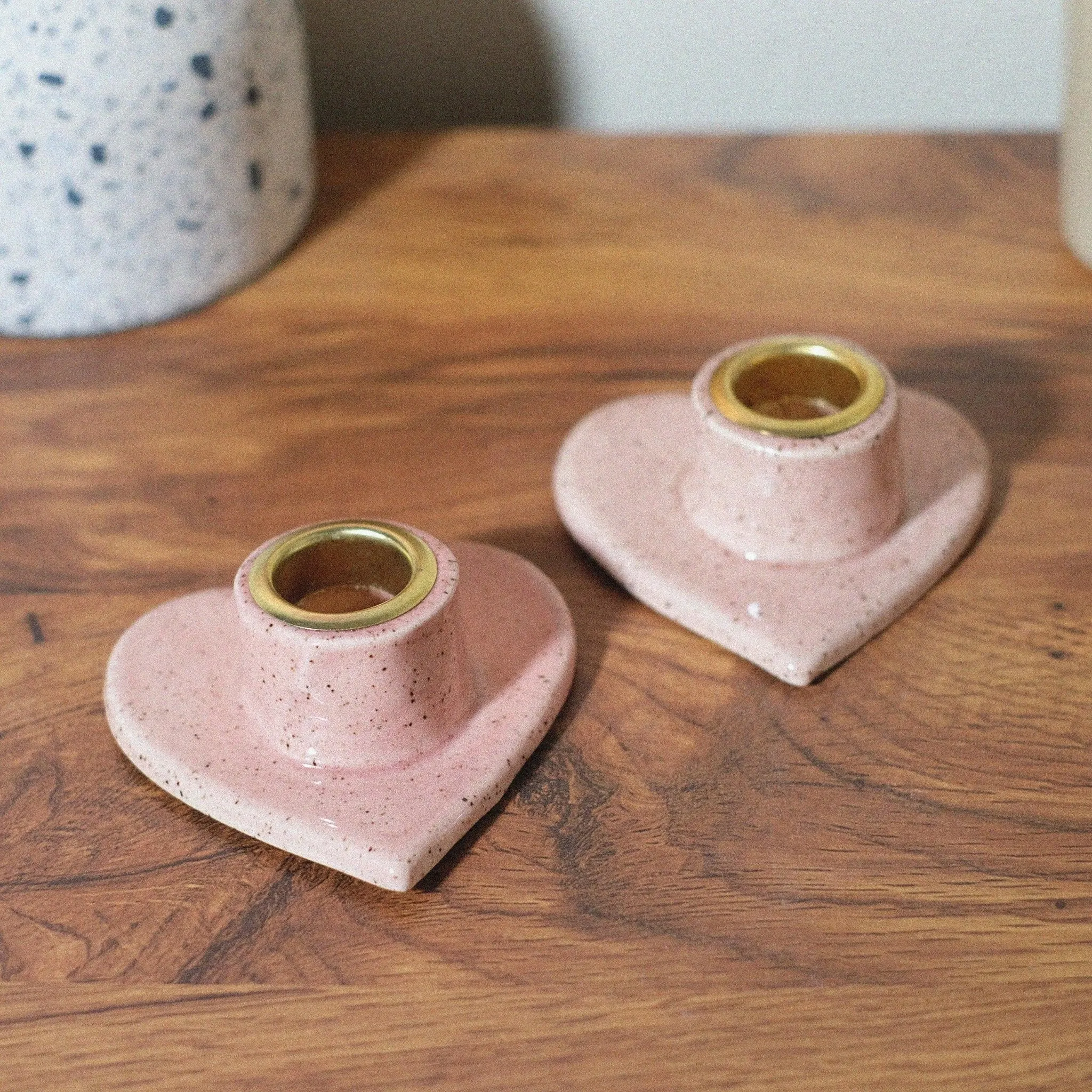 Pink speckled heart shaped candle holder set