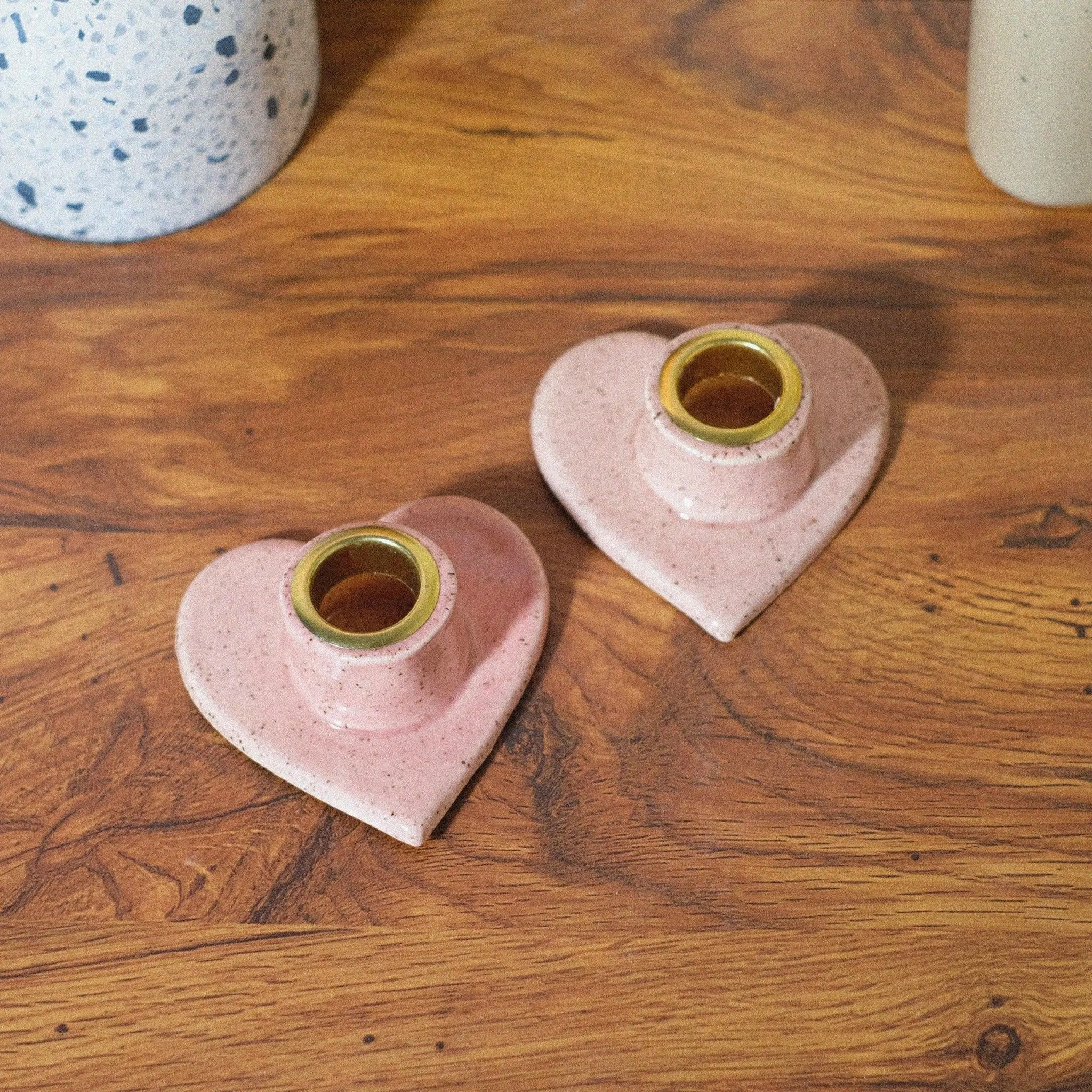 Pink speckled heart shaped candle holder set